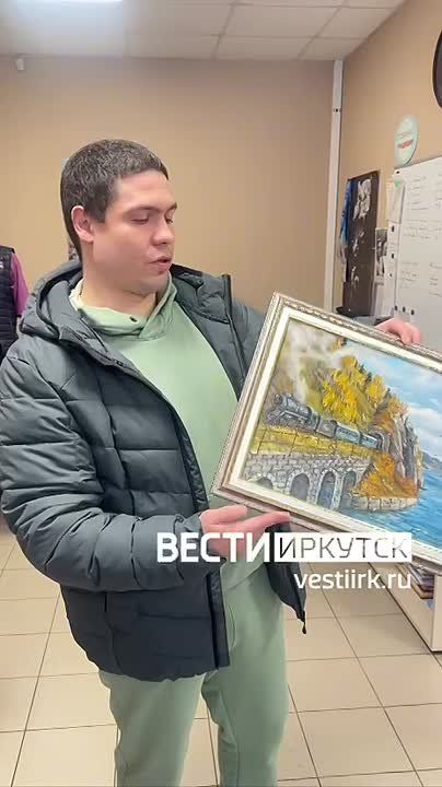 Боец с позывным «Аксель» подарил нашей редакции картину с подписями бойцов из Прибайкалья