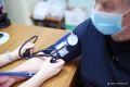 Почти треть (29%) жителей крупных городов посещают врачей раз в месяц, рассказали РИА Новости в "СберСтраховании"